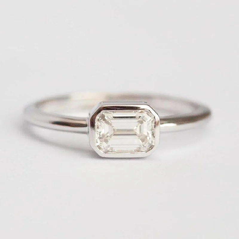 Versatile Layering Jewelry For Effortless Chic Emerald Cut White Diamond Solitaire Engagement Ring Versatile Layering Jewelry For Effortless Chic Emerald Cut White Diamond Solitaire Engagement Ring