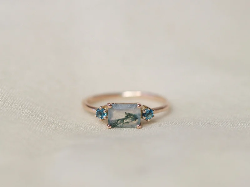 Shop Handcrafted Jewelry At Special Promotional Rates Trilogy Ring with Moss Agate and London Blue Topaz Shop Handcrafted Jewelry At Special Promotional Rates Trilogy Ring with Moss Agate and London Blue Topaz