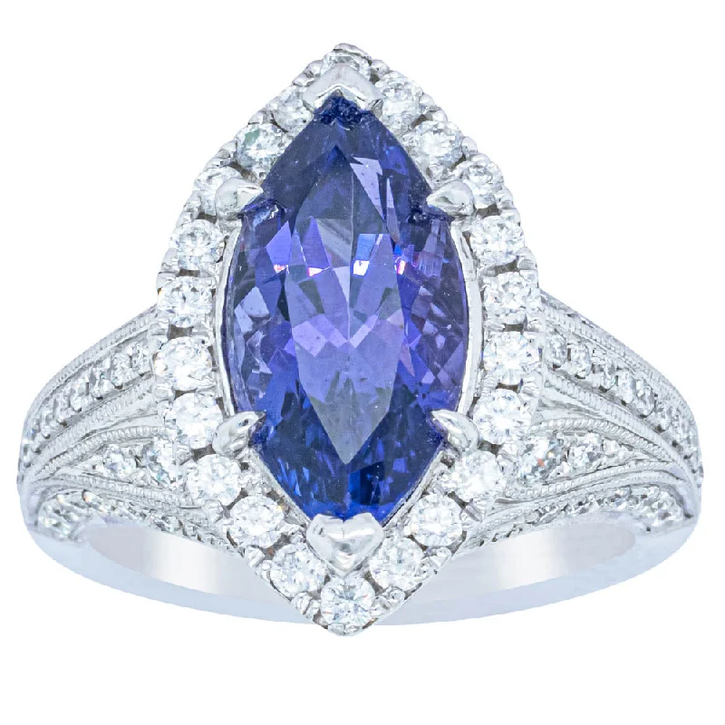 The Biggest Jewelry Sale Of The Year Is Here 18ct White Gold 3.84ct Tanzanite & Diamond Halo Ring