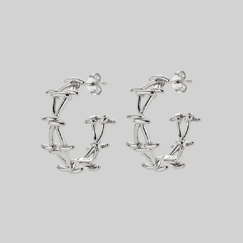Your Perfect Accessory At The Perfect Price BEYOND. Barbed Wire Hoop Earrings - Silver Your Perfect Accessory At The Perfect Price BEYOND. Barbed Wire Hoop Earrings - Silver