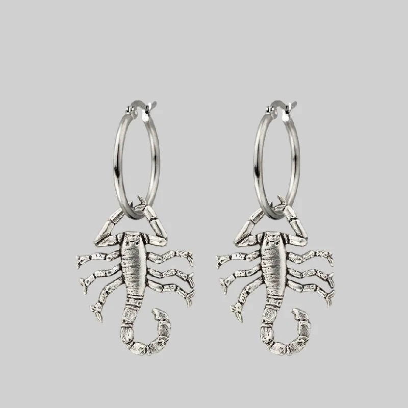 Best-Selling Jewelry Styles Now At Exclusive Discounts NOXIOUS. Scorpion Hoop Earrings - Silver Best-Selling Jewelry Styles Now At Exclusive Discounts NOXIOUS. Scorpion Hoop Earrings - Silver